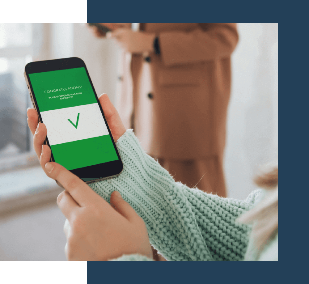 Person holding smartphone indicating loan approved